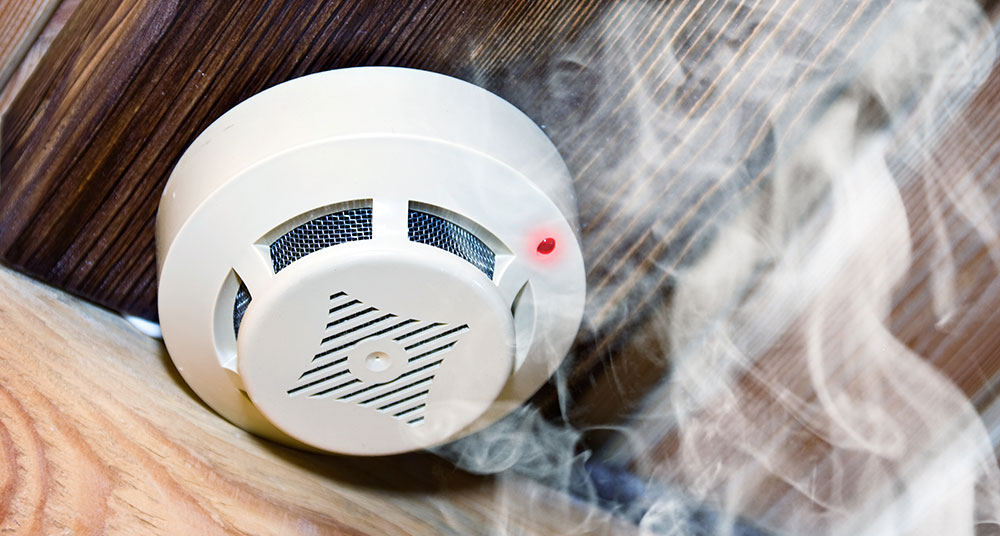 Smoke around a fire preventing smoke detector